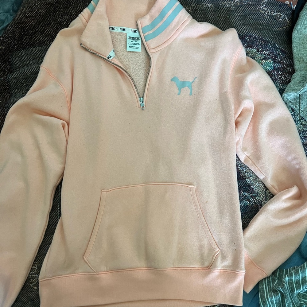 Pink pullover. Quarter zip